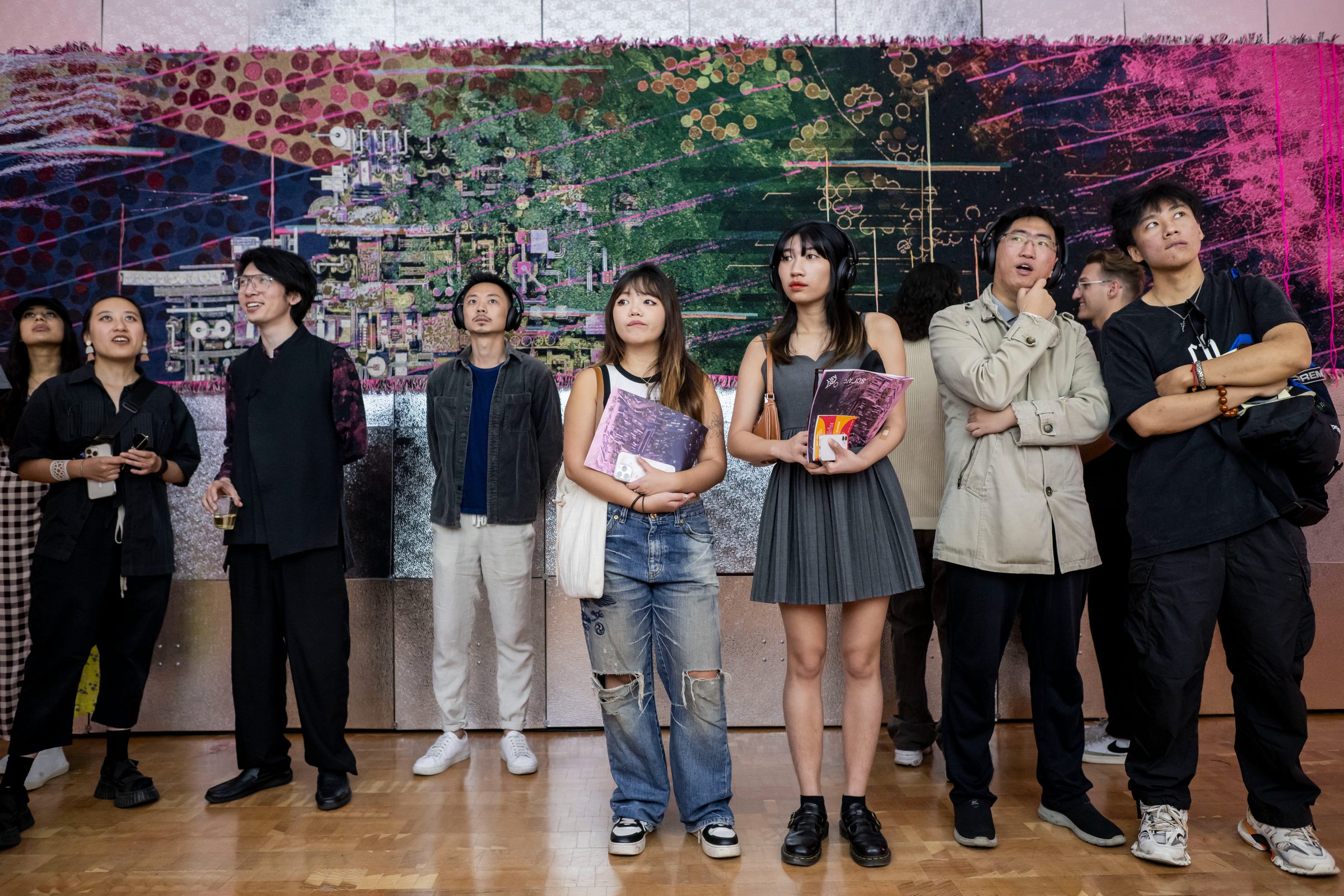 Views of Planet City — visitors at an interactive screen