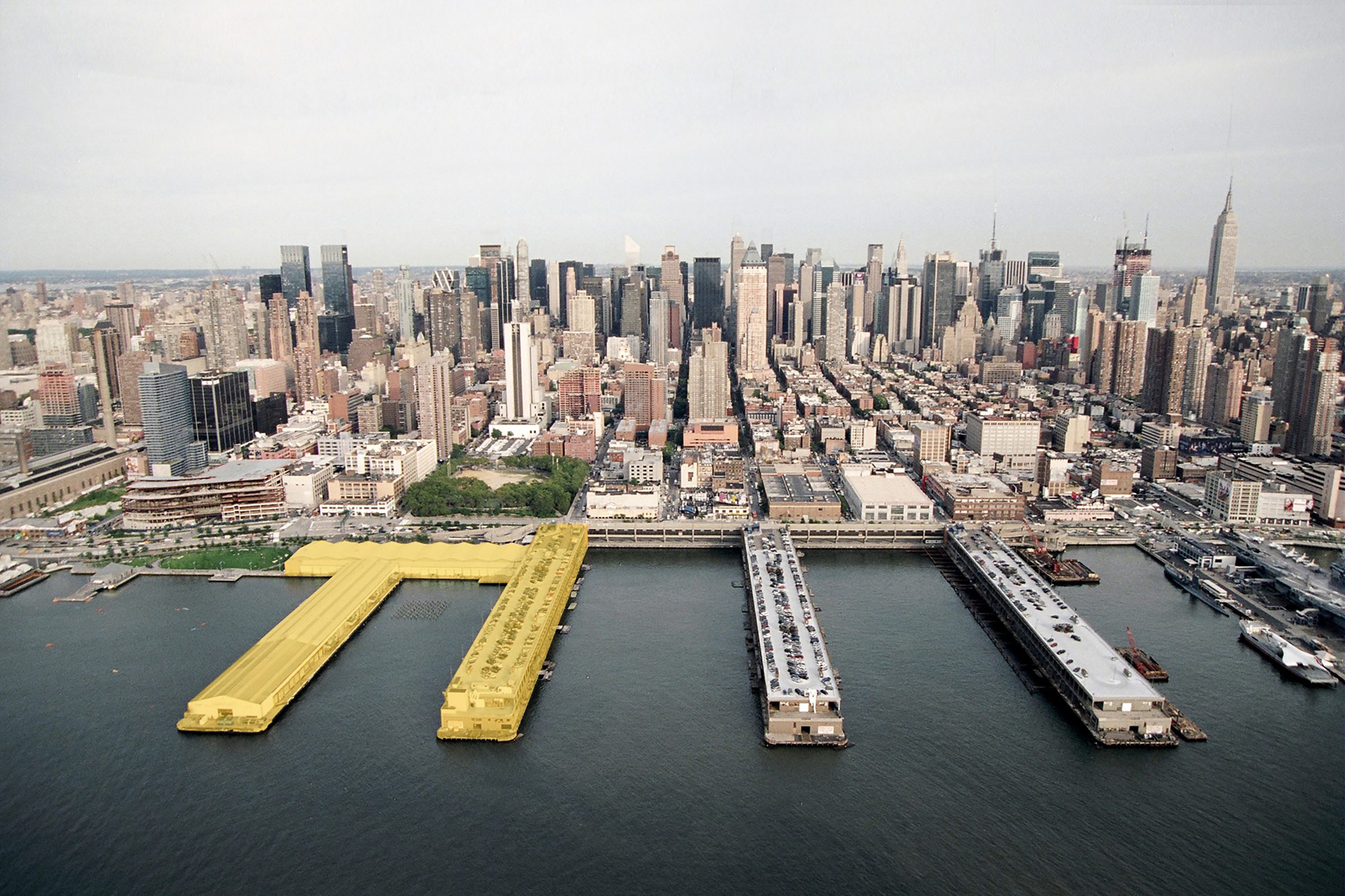 The Armory Show — aerial view of Piers 92 & 94 on the Hudson, Manhattan skyline beyond