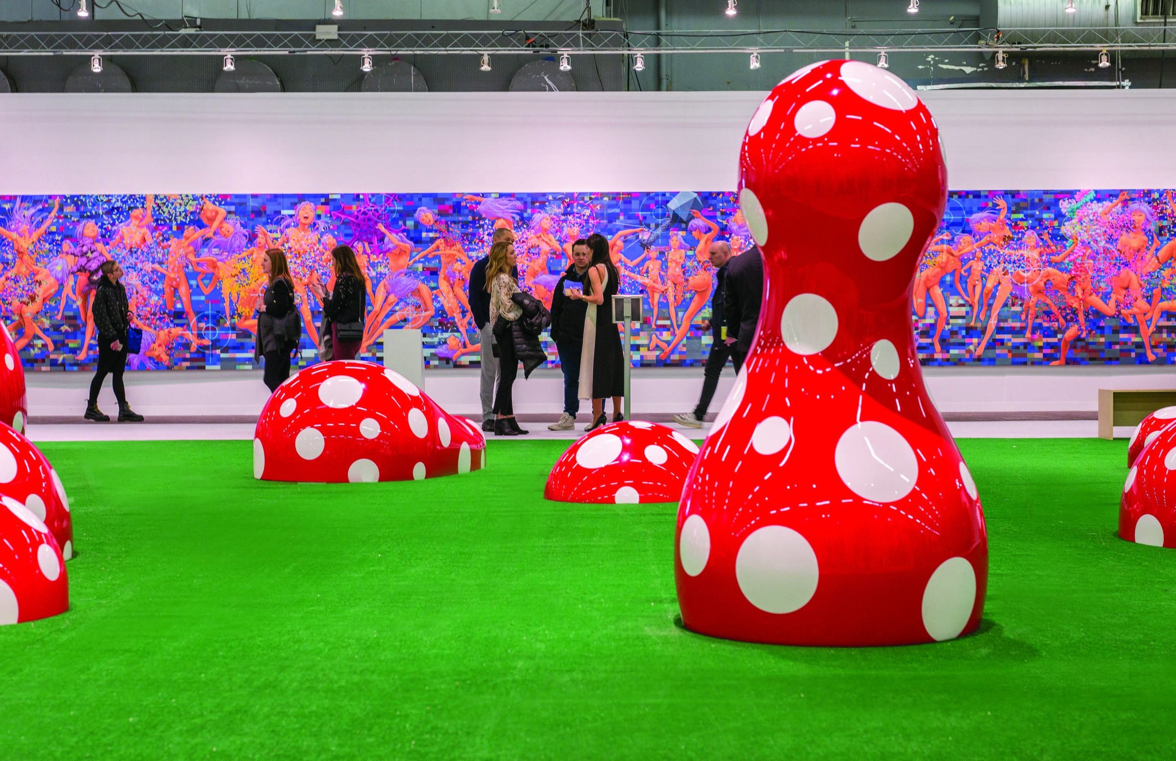The Armory Show — public art installation of red polka-dot forms on green turf